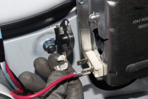 PHOTO: Remove the high-limit thermostat from the heater box.