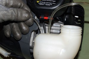 PHOTO: Pull the fuel lines from the fuel tank.