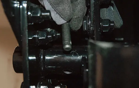PHOTO: Slide the clevis pin out.