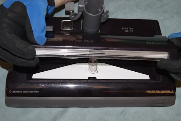 PHOTO: Remove the light cover.