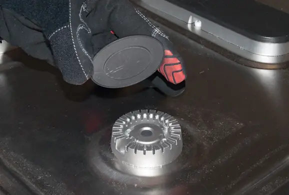 PHOTO: Remove the burner caps.
