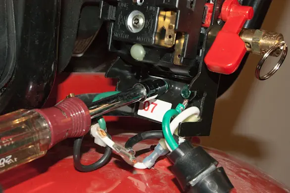 PHOTO: Disconnect the green wires.