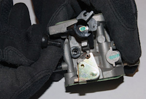 Remove the throttle stop screw.