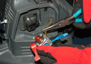 PHOTO: Remove the fuel lines from the carburetor.