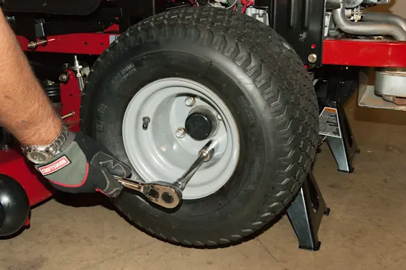 PHOTO: Remove the lug nuts.