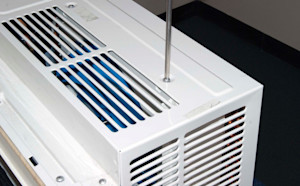 Remove the screws on top of the outer case.