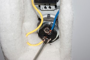 PHOTO: Reconnect the wires to the new heating element.