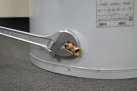 PHOTO: Install the new drain valve.