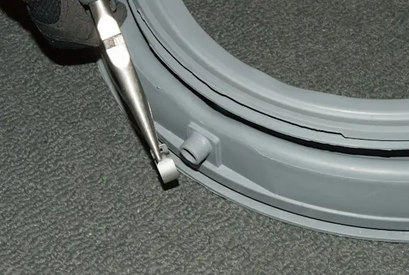 PHOTO: Transfer components to the new door boot.