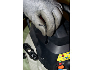 Remove the screws that hold the cylinder shield.