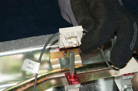 PHOTO: Lift off the igniter switches.