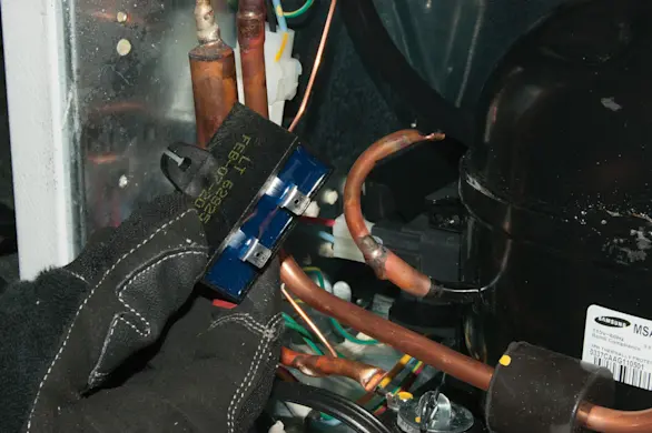 PHOTO: Pull out the capacitor.