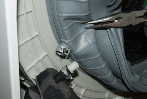 PHOTO: Pull the hoses off the door boot.