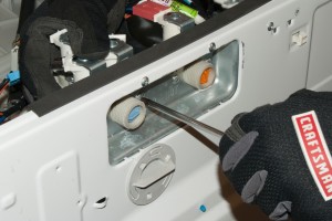 PHOTO: Remove the water inlet valve mounting screws.