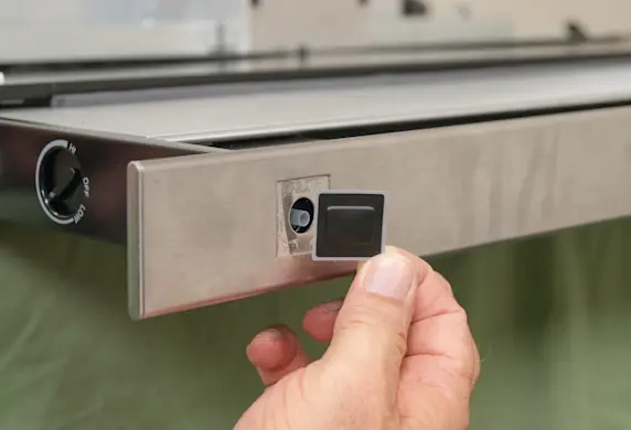 PHOTO: Attach the new button pad.
