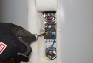 PHOTO: Attach the thermostat wires.