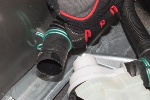 PHOTO: Reconnect the hoses to the drain pump.