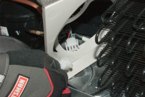 PHOTO: Plug in the condenser fan wire harness.