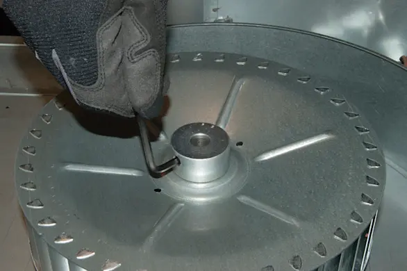 PHOTO: Loosen the fan blade set screw.