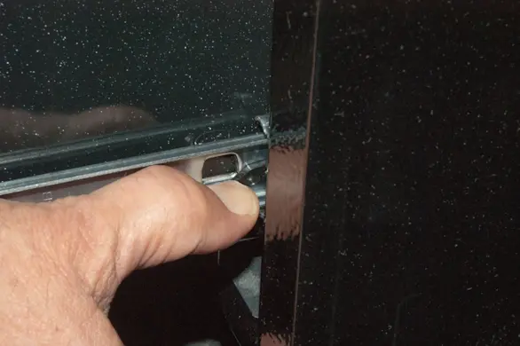 PHOTO: Push the right release lever down.