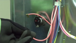 PHOTO: Disconnect the thermal switch wires.