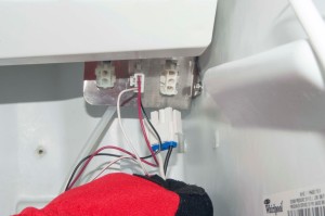 PHOTO: Disconnect the recirculation pump and sensor wires.