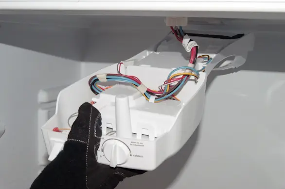PHOTO: Reinstall the control box.