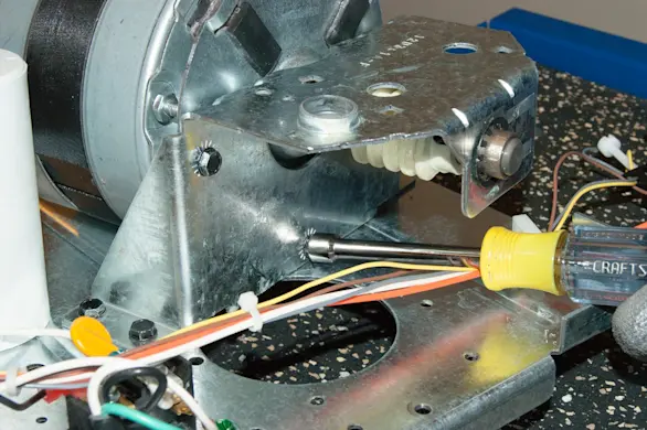 PHOTO: Remove the mounting screws.