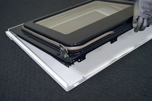 PHOTO: Remove the inner door panel.