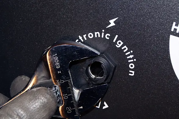 PHOTO: Remove the nut that holds the module in place.