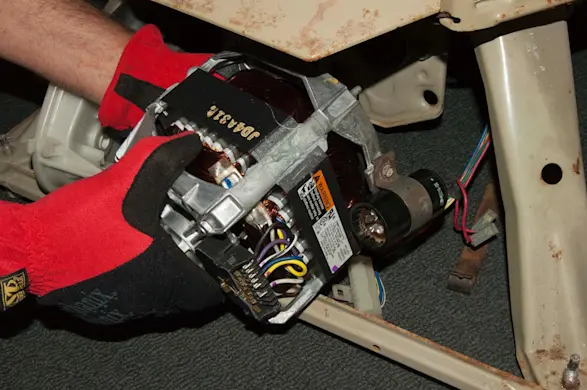 PHOTO: Push the drive motor into place.