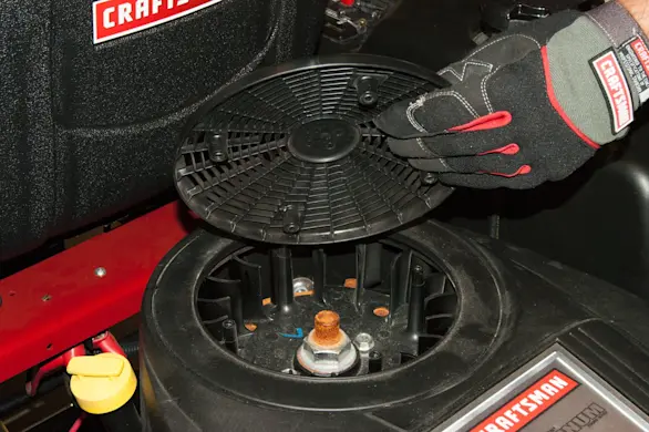 PHOTO: Reattach the flywheel cover.