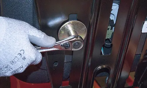 PHOTO: Reinstall the seat mounting bolt.