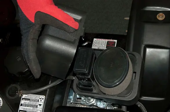 PHOTO: Reinstall the air filter cover.