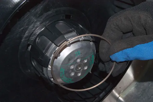 PHOTO: Reinstall the fan blade spring clamp.