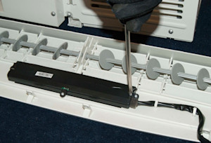 Reinstall the screws in the case.