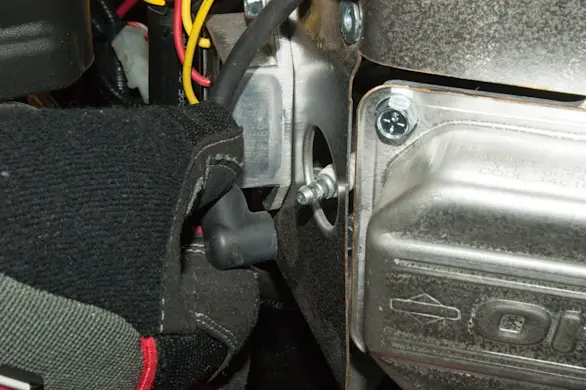 PHOTO: Reconnect the spark plugs.