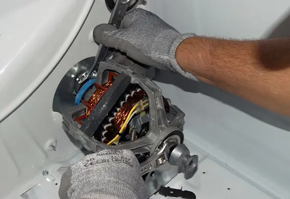 PHOTO: Loosen the blower wheel.