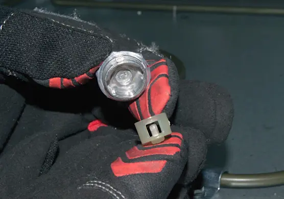 PHOTO: Remove the plastic conversion plug.