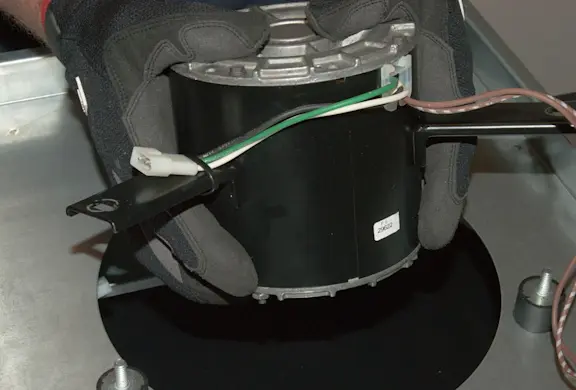 PHOTO: Install the new blower motor.