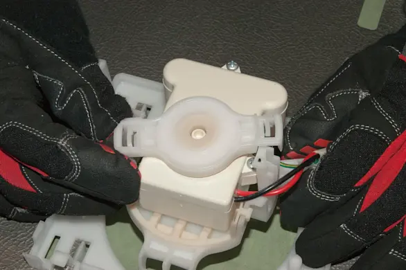 PHOTO: Release the fan retainer.