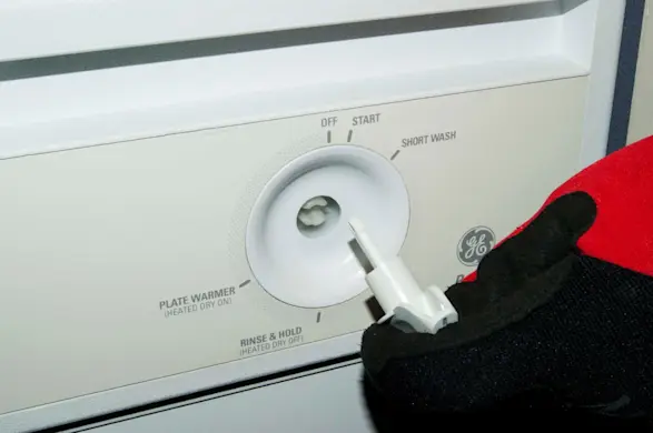PHOTO: Pull off the timer knob.