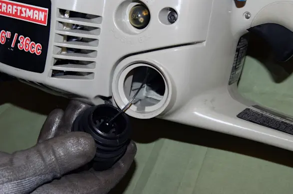 PHOTO: Open the fuel cap.