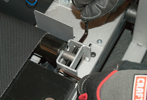 Remove the front roller screw.
