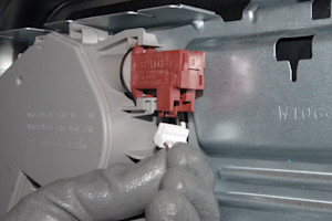 Disconnect the wire harness.