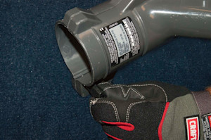 Remove the blower tube thumb screw.