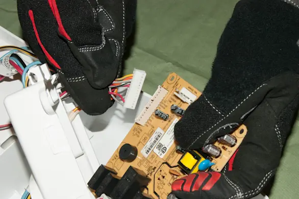 PHOTO: Disconnect the control board wires.