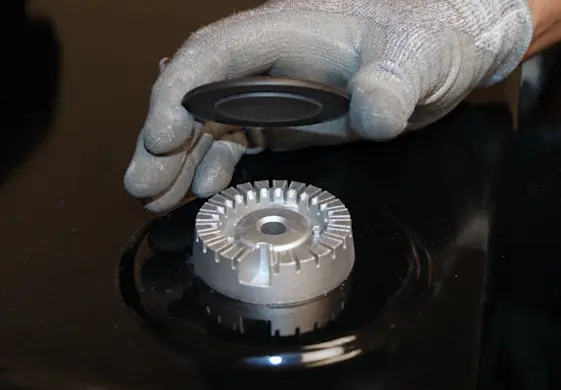 PHOTO: Remove the burner caps.