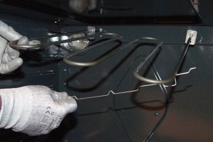 PHOTO: Install the new broil element.