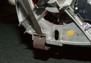 PHOTO: Remove the bottom motor retainer clip.